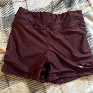 Varisity brand form fitting maroon athletic shorts